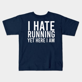 i hate running yet here i am Kids T-Shirt